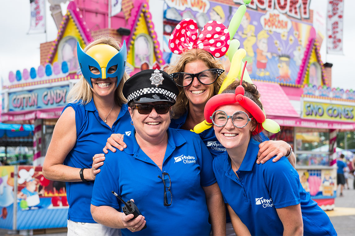 4 Hydro Ottawa employees at a fairground