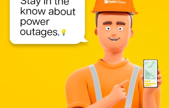A cartoon powerline worker holding a cell phone points at it with a word bubble that reads "Stay in the know about power outages."